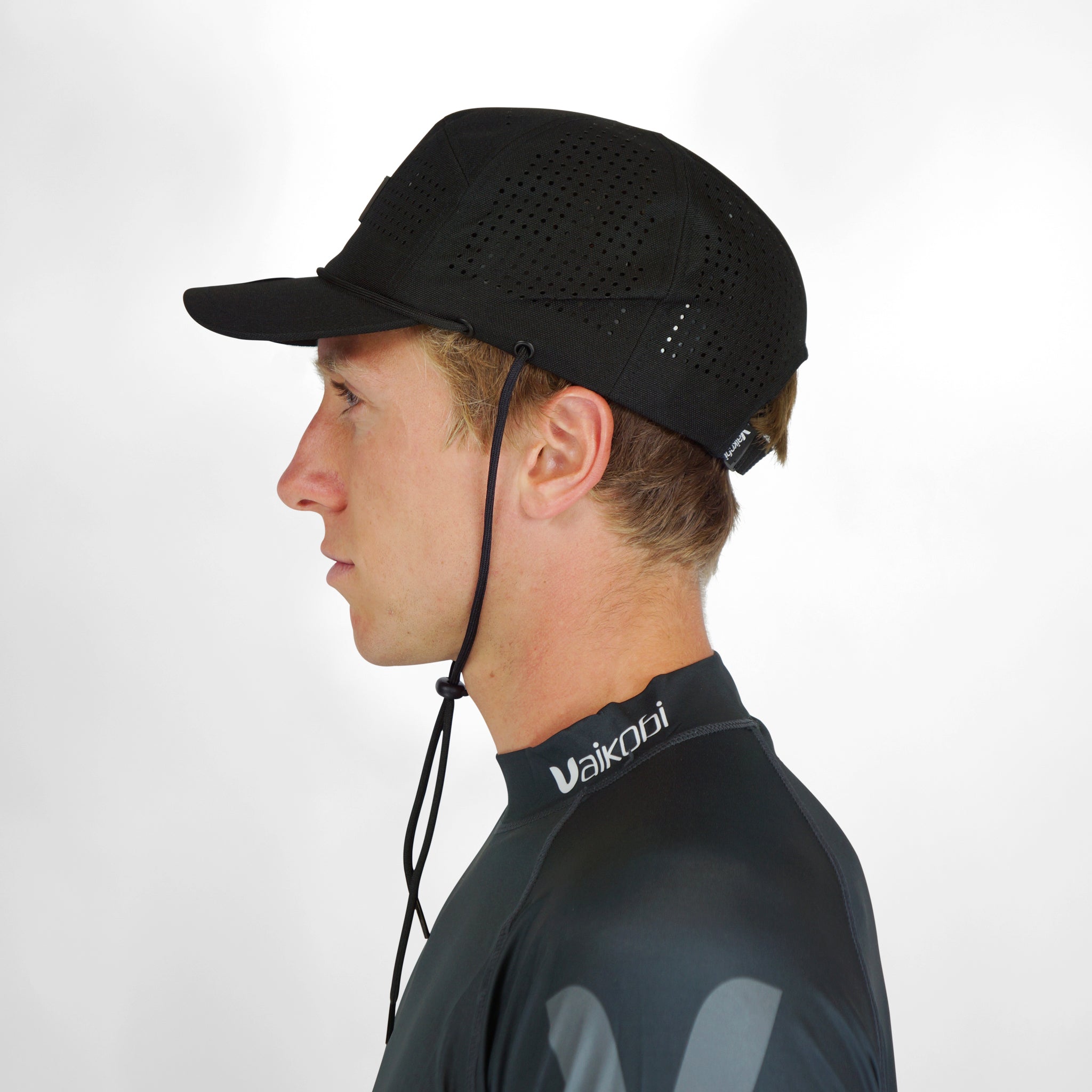 Vaikobi IPS Cap with cord - Dinghy Sailing Head Protection (helmet) - Black (VK-405-BK)

LIGHTWEIGHT BUMP, KNOCK &amp; CUT PROTECTION FOR WATERSPORTS

Vaikobi's NEW IPS - IMPACT PROTECTION SYSTEM - The perfect solution to dinghy sailing head protection. A great and comfortable alternative to a full dinghy sailing helmet.
