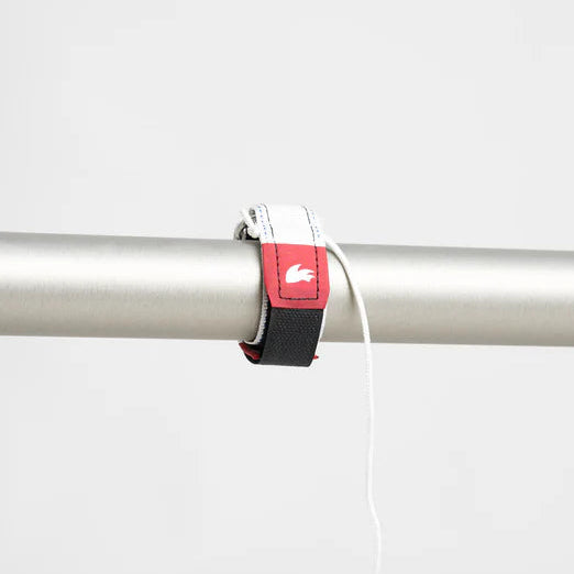 Rooster Clew Strap for Topper/Tera - 55mm (127416)

Roosters ultimate clew tie down.&nbsp;

This simple and clever design holds the clew tightly in place for optimal sail shape. It is easy&nbsp; to fit and slides freely on the boom with outhaul adjustment.

Class legal complete with a retaining line, which can be tied to the sail clew eye to prevent loss.

This item is for 50mm boom diameter to suit Laser/ILCA and Feva, but can be used on other classes of boat as well.