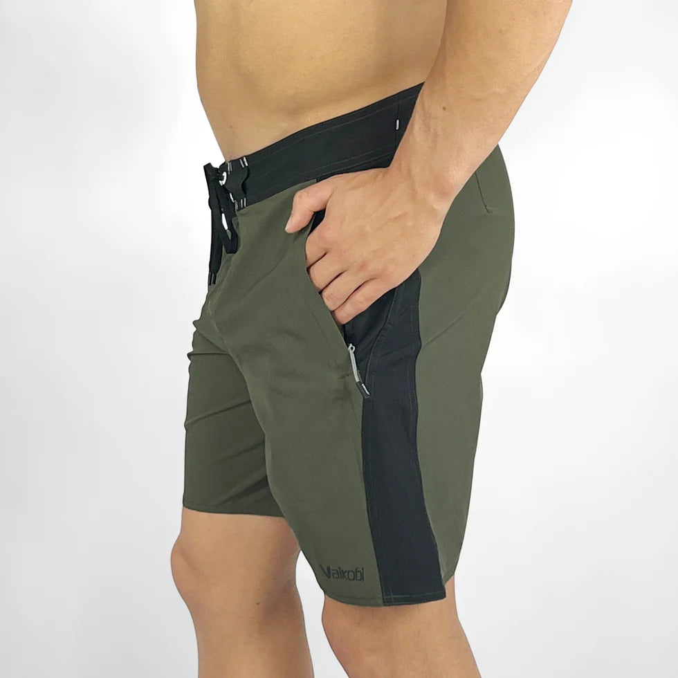 Vaikobi Newport Boardie (VK-262) Green and black shorts with a visible brand logo on a white background