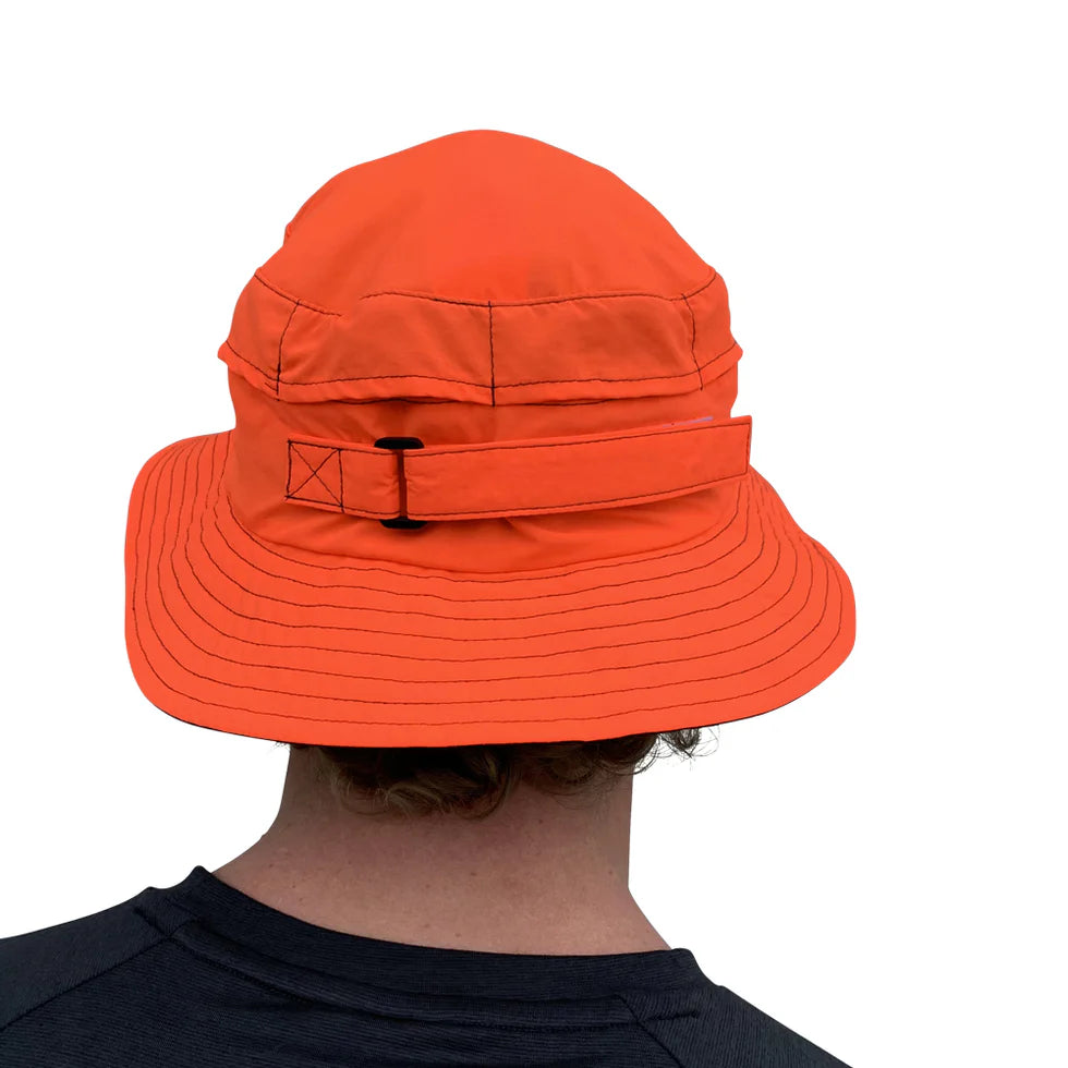 Vaikobi Downwind Surf Hat (VK-260) Orange bucket hat worn by a person on a white background