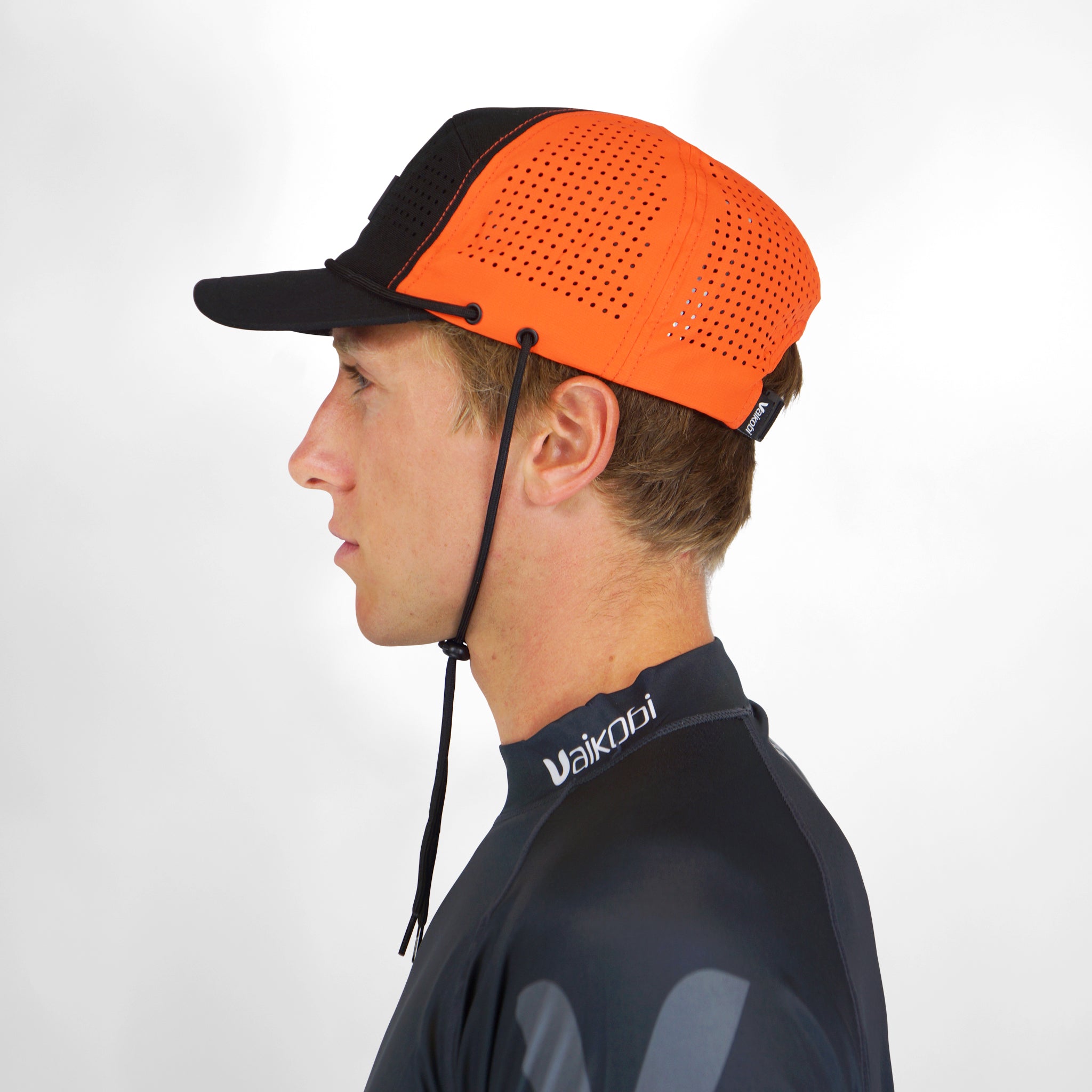 Vaikobi IPS Cap with cord - Dinghy Sailing Head Protection (helmet) - Orange (VK-405-OR)

LIGHTWEIGHT BUMP, KNOCK &amp; CUT PROTECTION FOR WATERSPORTS

Vaikobi's NEW IPS - IMPACT PROTECTION SYSTEM - The perfect solution to dinghy sailing head protection. A great and comfortable alternative to a full dinghy sailing helmet.