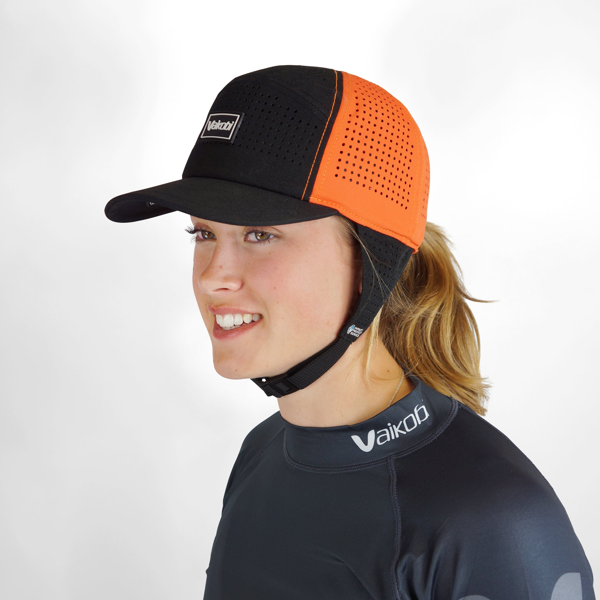 Vaikobi IPS Cap with cord - Dinghy Sailing Head Protection (helmet) - Orange (VK-405-OR)

LIGHTWEIGHT BUMP, KNOCK &amp; CUT PROTECTION FOR WATERSPORTS

Vaikobi's NEW IPS - IMPACT PROTECTION SYSTEM - The perfect solution to dinghy sailing head protection. A great and comfortable alternative to a full dinghy sailing helmet.
