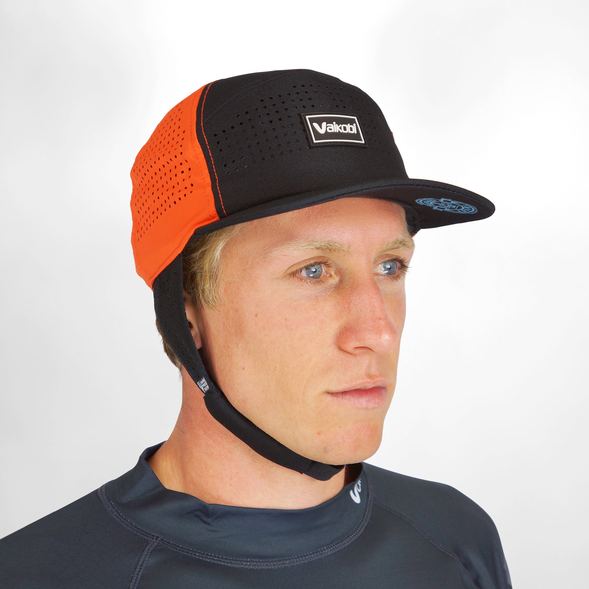 Vaikobi IPS Cap with cord - Dinghy Sailing Head Protection (helmet) - Orange (VK-405-OR)

LIGHTWEIGHT BUMP, KNOCK &amp; CUT PROTECTION FOR WATERSPORTS

Vaikobi's NEW IPS - IMPACT PROTECTION SYSTEM - The perfect solution to dinghy sailing head protection. A great and comfortable alternative to a full dinghy sailing helmet.